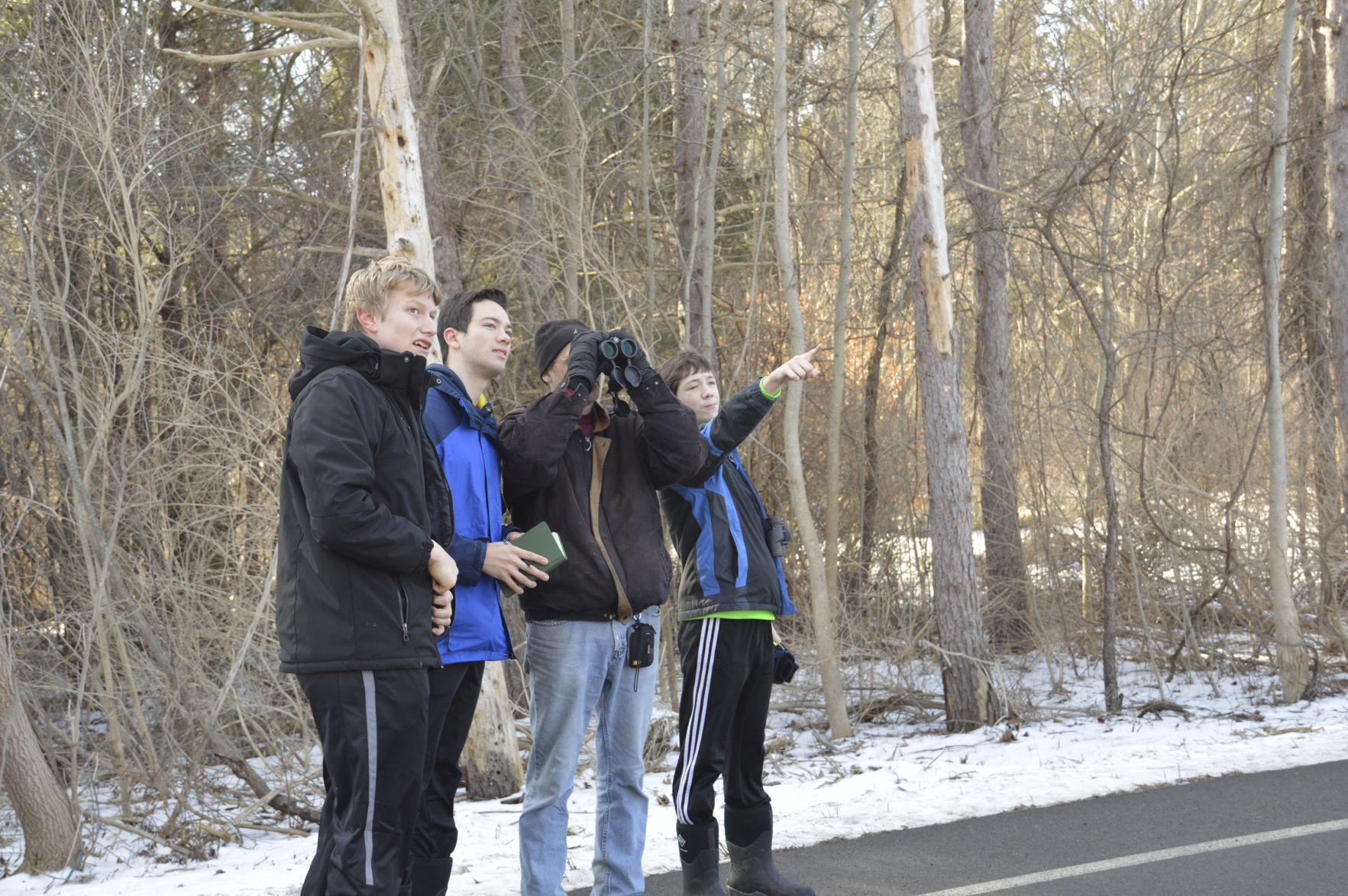 Jody Enck (with binoculars) searching fot birds on New Year’s Day